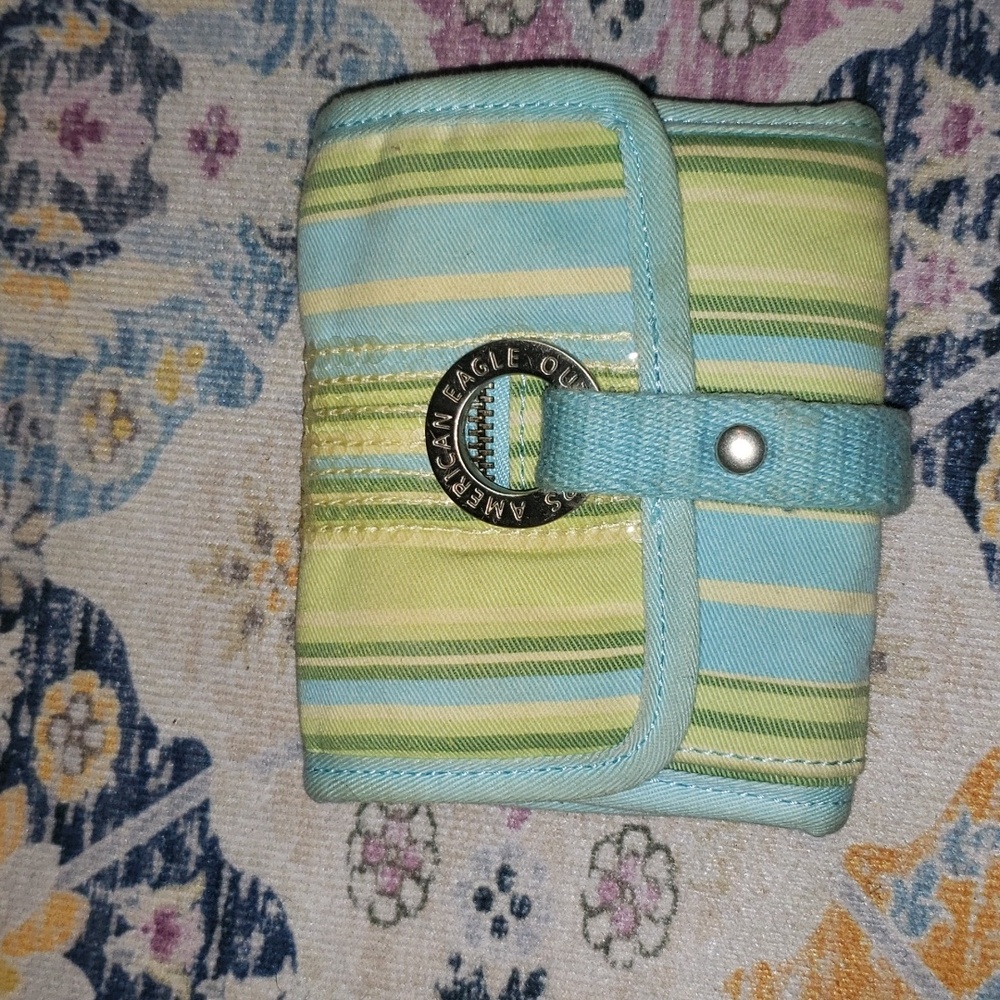 AMERICAN EAGLE BLUE GREEN AND YELLOW  WALLET WITH CLEAR GLITTER